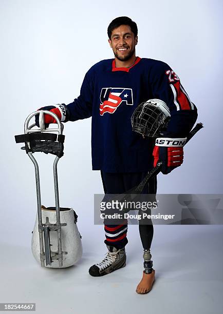 Sled hockey player Rico Roman poses for a portrait during the USOC Media Summit ahead of the Sochi 2014 Paralympic Winter Games on September 29, 2013...