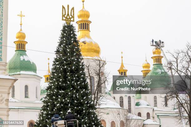 The trident, which is the main element of the minor Ukrainian coat of arms and the Ukrainian national symbol, is crowning the main Christmas tree of...