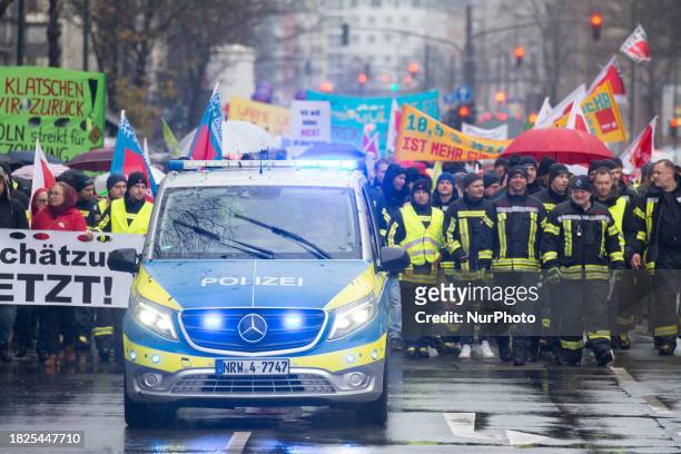 Public sector workers from hospitals, state administrations, education, police, and other public sectors are striking in Dusseldorf, Germany, on...