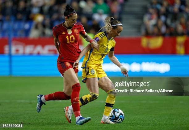 Jennifer Hermoso of Spain and Kosovare Asllani of Sweden during the UEFA Women's Nations League match between Spain and Sweden at La Rosaleda Stadium...