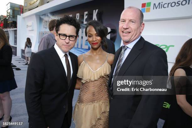 Director/Writer J.J Abrams, Zoe Saldana and Vice Chairman of Paramount Pictures Rob Moore arrive at the LA premiere of "Star Trek Into Darkness" at...