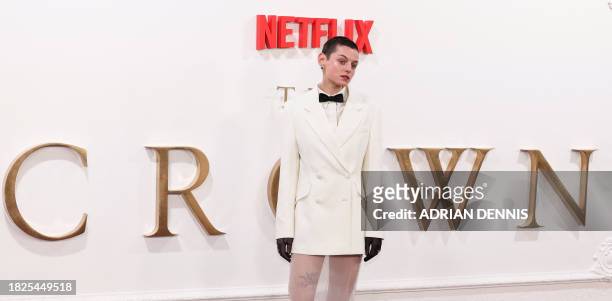 British actor Emma Corrin poses on the red carpet upon arrival to attend the Premiere of "The Crown Finale Celebration" at the Royal Festival Hall,...