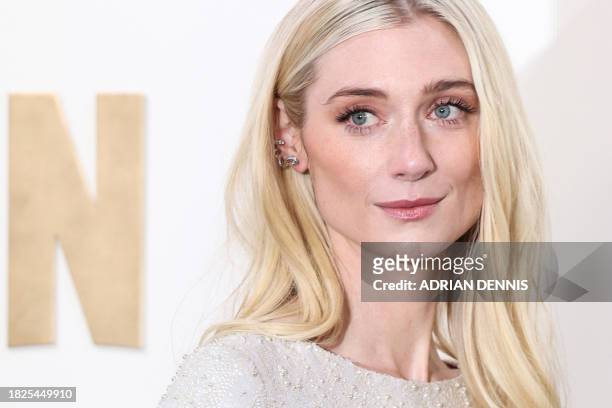 Australian actress Elizabeth Debicki poses on the red carpet upon arrival to attend the Premiere of "The Crown Finale Celebration" at the Royal...