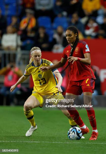 Amanda Ilestedt of Sweden and Salma Paralluelo of Spain challenge during the UEFA Womens Nations League match between Spain and Sweden at La Rosaleda...