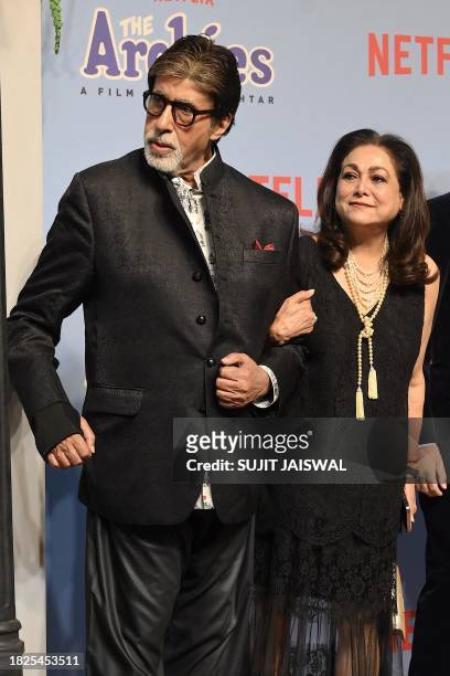Bollywood actors Amitabh Bachchan and Tina Ambani attend the premiere of Netflix's Indian Hindi-Language teen musical comedy film 'The Archies' in...