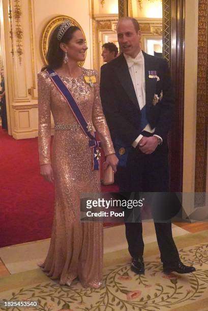 Prince William, Prince of Wales and Catherine, Princess of Wales at an evening reception for members of the Diplomatic Corps at Buckingham Palace on...