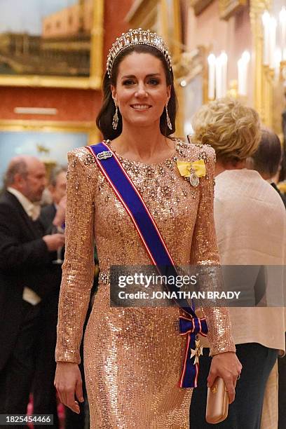 Britain's Catherine, Princess of Wales attends a reception for members of the Diplomatic Corps at Buckingham Palace, in London, on December 5, 2023.