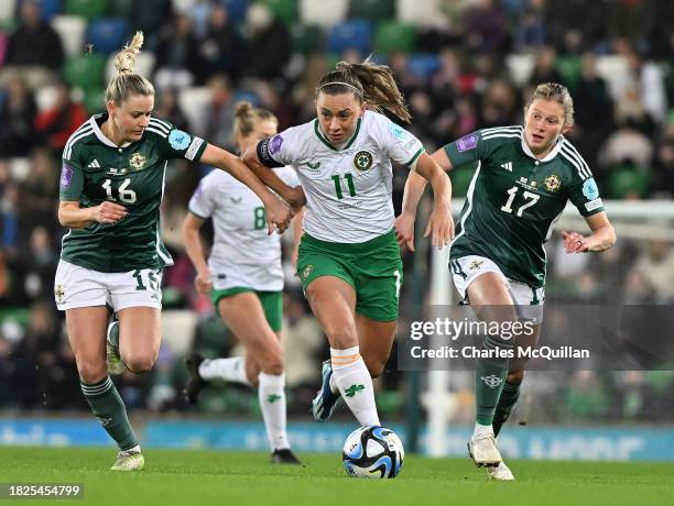 Nadene Caldwell and Caragh Hamilton of Northern Ireland and Katie McCabe of Republic of Ireland battle for the ball during the UEFA Womens Nations...