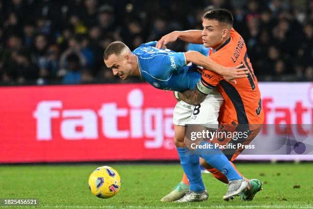 Stanislav Lobotka of SSC Napoli competes for the ball with Lautaro Martínez of FC Internazionale during the Serie A match between SSC Napoli vs FC...