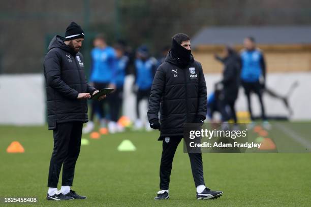 Damia Abella Statistical Analyst of West Bromwich Albion and Jorge Alarcon coach of West Bromwich Albion during a first team training session at West...