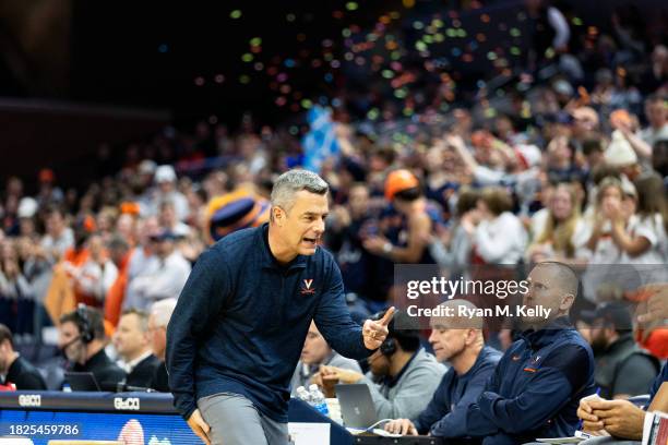 Head coach Tony Bennett of the Virginia Cavaliers reacts to a play in the first half during a game against the North Carolina Central Eagles at John...