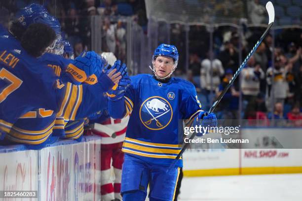 Jeff Skinner of the Buffalo Sabres celebrates his third period goal with teammates on the bench during an NHL game against the Detroit Red Wings on...