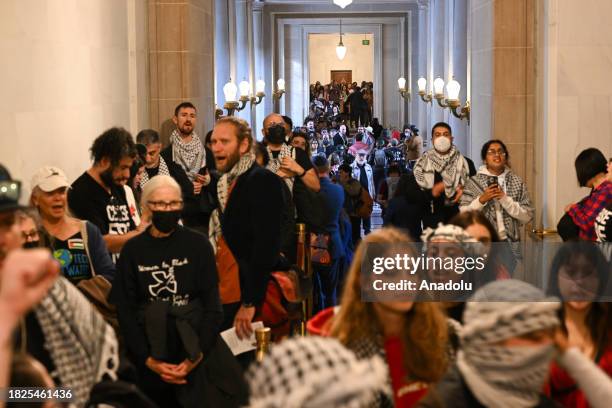 Over two thousand people pack S.F. City Hall as supervisor Dean Preston introduces resolution calling for cease-fire in Israeli attacks on Gaza,...