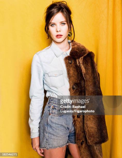 Singer Lou Lesage is photographed for Madame Figaro on July 19, 2013 in Paris, France. Coat , shirt , shorts , earrings . CREDIT MUST READ: Raphael...