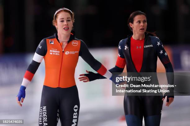 Antoinette Rijpma-De Jong of Netherlands and Brittany Bowe of USA compete in the 1000m Women race on Day 1 of the ISU World Cup Speed Skating at Var...