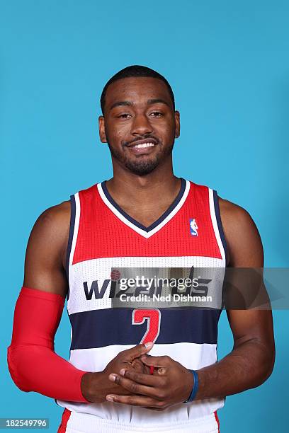 John Wall of the Washington Wizards poses for a portrait during 2013 NBA Media Day at the Verizon Center on September 27, 2013 in Washington, DC....