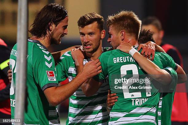 Florian Trinks of Greuther Fuerth celebrates his team's second goal with team mates during the Bundesliga match between SpVgg Greuther Fuerth and...