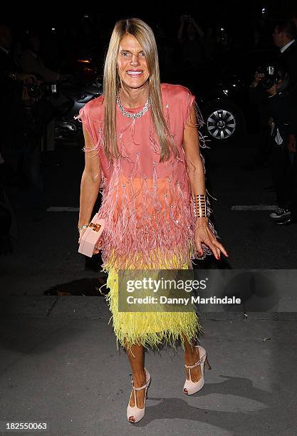 Anna Dello Russo attends the Saint Laurent show during Paris Fashion Week Womenswear Spring/Summer 2014 on September 30, 2013 in Paris, France.