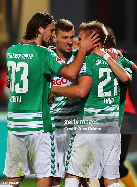 Florian Trinks of Greuther Fuerth celebrates his team's second goal with team mates during the Bundesliga match between SpVgg Greuther Fuerth and...