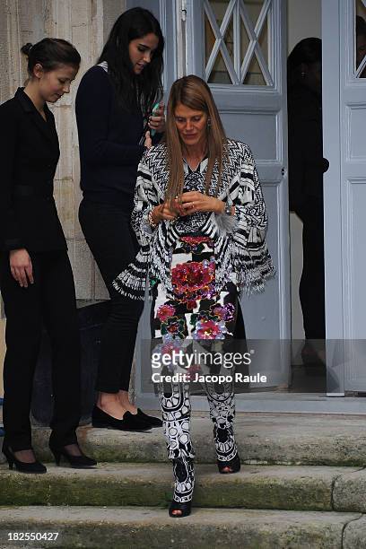 Anna Dello Russo leaves the Delfina Delettrez Presents Jewelry Collection during Paris Fashion Week Womenswear SS14 - Day 7 on September 30, 2013 in...