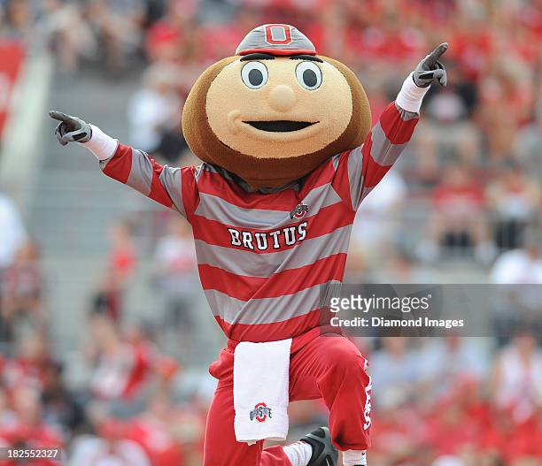 Mascot Brutus the Buckeye of the Ohio State Buckeyes celebrates after doing push ups after a touchdown during a game against the San Diego State...