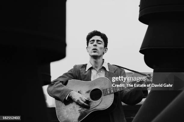 Folk and bluegrass musician and singer songwriter John Herald poses for a portrait in October 1963 on a Greenwich Village rooftop in New York City,...