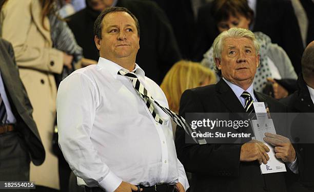 Newcastle owner Mike Ashley and Joe Kinnear look on before the Barclays Premier League match between Everton and Newcastle United at Goodison Park on...