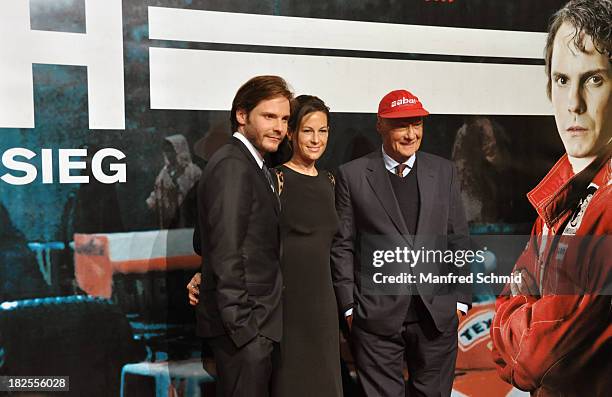 Daniel Bruehl, Birgit Lauda, Niki Lauda attend the Austria premiere of the film 'Rush' at Gartenbaukino on September 30, 2013 in Vienna, Austria.