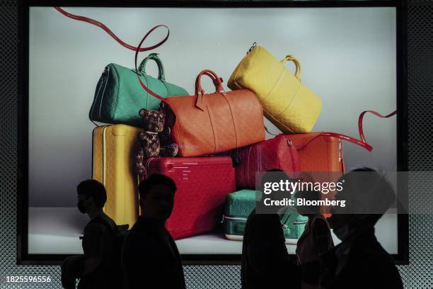 Pedestrians pass a Louis Vuitton store in Taipei, Taiwan, on Tuesday, Dec. 5, 2023. Taiwan's consumer prices rose more than economists expected in...