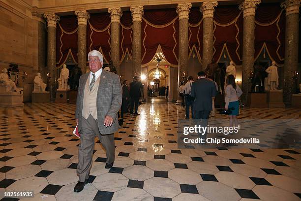 Rep. Rob Bishop leaves the House floor after a vote on a budget continuing resolution that would fund the federal government but postpone the...