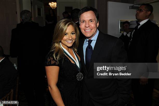 Shawn Johnson and Bob Costas attend the 28th Annual Great Sports Legends Dinner to Benefit The Buoniconti Fund To Cure Paralysis at The...