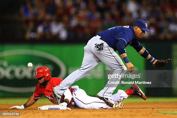 Elvis Andrus of the Texas Rangers steals second base against Yunel Escobar of the Tampa Bay Rays in the sixth inning during the American League Wild...