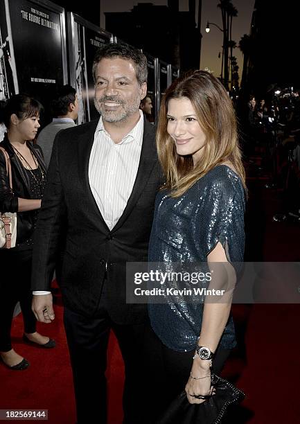 Producer Michael De Luca and Angelique Madrid arrive at the premiere of Columbia Pictures' "Captain Phillips" at the Academy of Motion Picture Arts...