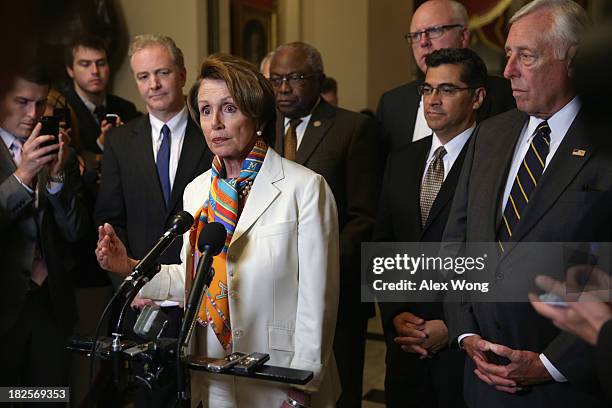 House Minority Leader Rep. Nancy Pelosi speaks as Rep. Chris Van Hollen , Assistant House Minority Leader Rep. James Clyburn , House Democratic...