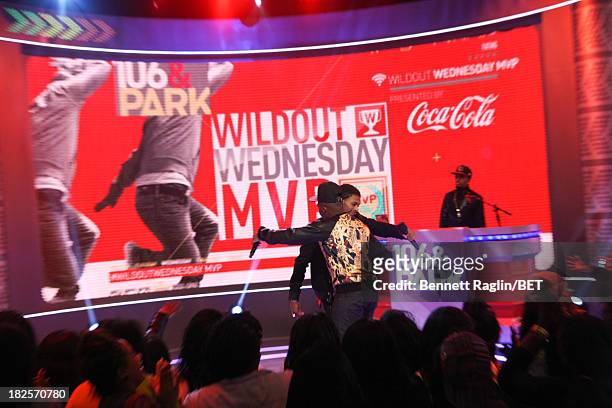 Wild Out Wednesday winner Reese Rell and recording artist Diggy Simmons perform during 106 & Park at 106 & Park studio on September 30, 2013 in New...