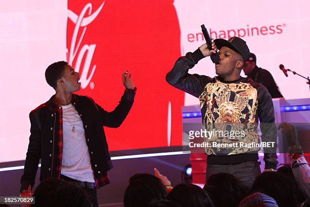 Recording artist Diggy Simmons and Wild Out Wednesday winner Reese Rell perform during 106 & Park at 106 & Park studio on September 30, 2013 in New...