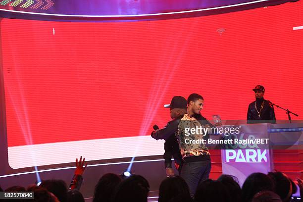Wild Out Wednesday winner Reese Rell and recording artist Diggy Simmons perform during 106 & Park at 106 & Park studio on September 30, 2013 in New...