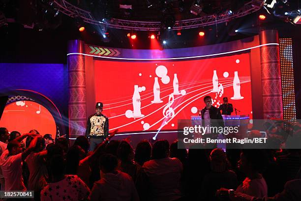 Wild Out Wednesday winner Reese Rell and recording artist Diggy Simmons perform during 106 & Park at 106 & Park studio on September 30, 2013 in New...