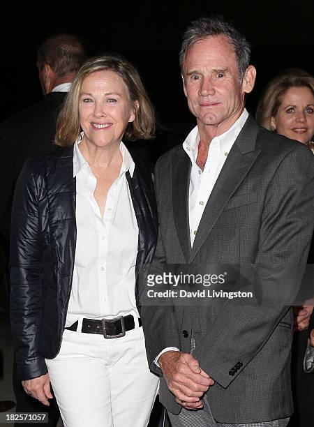 Actress Catherine O'Hara and husband production designer Bo Welsh attend the premiere of Columbia Pictures' "Captain Phillips" at the Academy of...