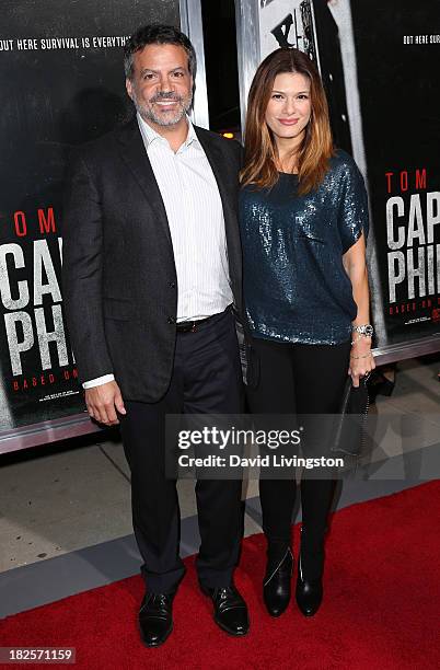 Producer Michael De Luca and wife Angelique De Luca attend the premiere of Columbia Pictures' "Captain Phillips" at the Academy of Motion Picture...