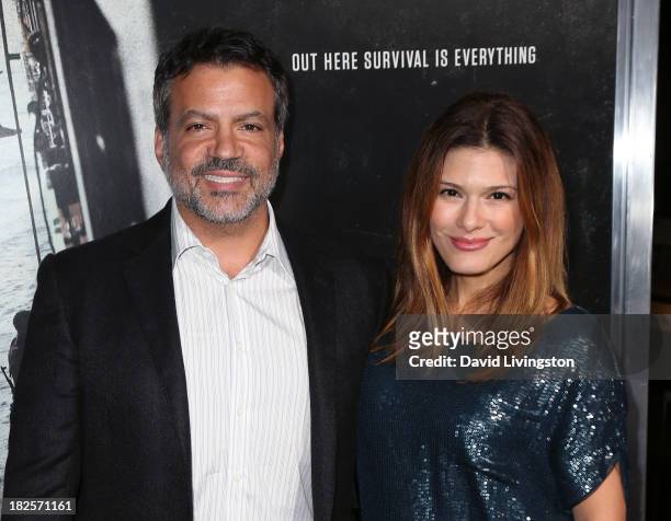 Producer Michael De Luca and wife Angelique De Luca attend the premiere of Columbia Pictures' "Captain Phillips" at the Academy of Motion Picture...
