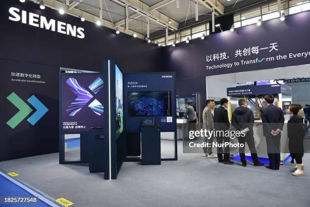 Visitors are visiting the Siemens exhibition area at the 2023 World Intelligent Manufacturing Conference at the Nanjing International Expo Center in...