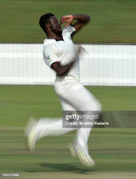 Solomon Mire of Victoria bowls during day two of the Futures League match between Queensland and Victoria at Allan Border Field on October 1, 2013 in...