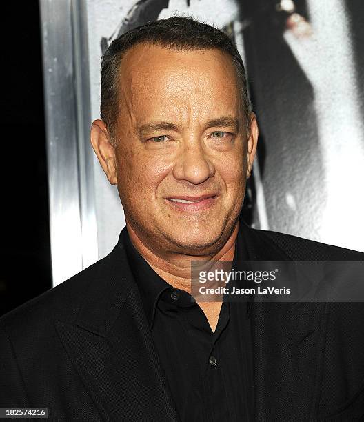 Actor Tom Hanks attends the premiere of "Captain Phillips" at the Academy of Motion Picture Arts and Sciences on September 30, 2013 in Beverly Hills,...