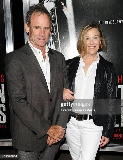 Actress Catherine O'Hara and husband Bo Welch attend the premiere of "Captain Phillips" at the Academy of Motion Picture Arts and Sciences on...