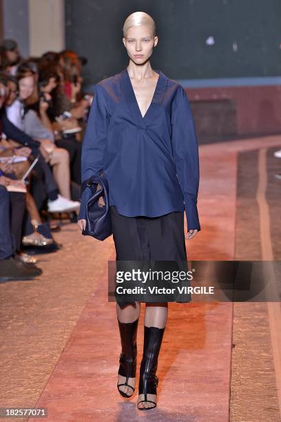 Model walks the runway during Cedric Charlier show as part of the Paris Fashion Week Womenswear Spring/Summer 2014 on September 24, 2013 in Paris,...