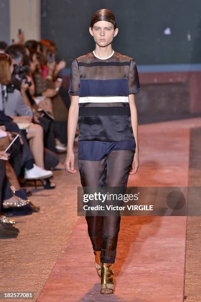 Model walks the runway during Cedric Charlier show as part of the Paris Fashion Week Womenswear Spring/Summer 2014 on September 24, 2013 in Paris,...