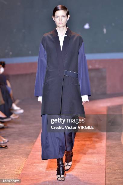 Model walks the runway during Cedric Charlier show as part of the Paris Fashion Week Womenswear Spring/Summer 2014 on September 24, 2013 in Paris,...