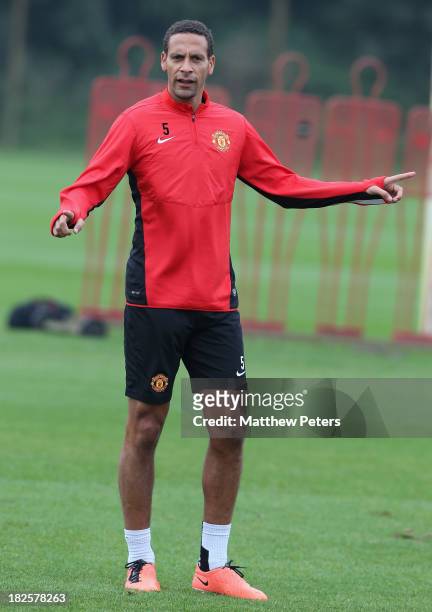 Rio Ferdinand of Manchester United in action during a first team training session, ahead of their UEFA Champions League match against Shaktar...