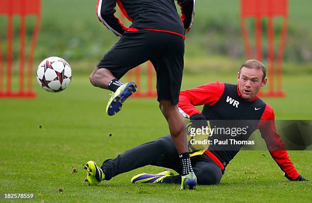 Wayne Rooney of Manchester United in action during a training session ahead of their Champions League Group A match against Shakhtar Donetsk at their...